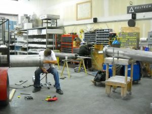 Production Lead Bryan Smith of Deltech Furnaces at work on component for installation of geothermic fuel cell GFC 